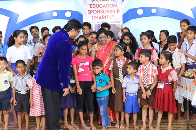 Grace Ministry, Bro Andrew Richard contributed 50 poor students free education scholarship at its centre on account of Christmas season in Mangalore here on Dec 15th, Sunday, 2019. 